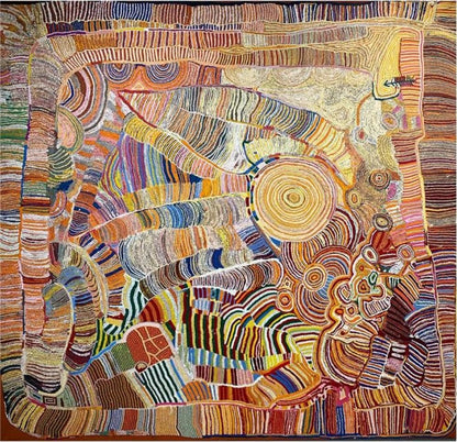 Artist artists creates artwork through embroidery