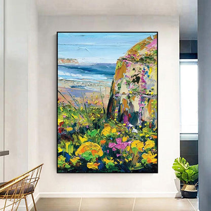 On the coast, there are grass and flowers